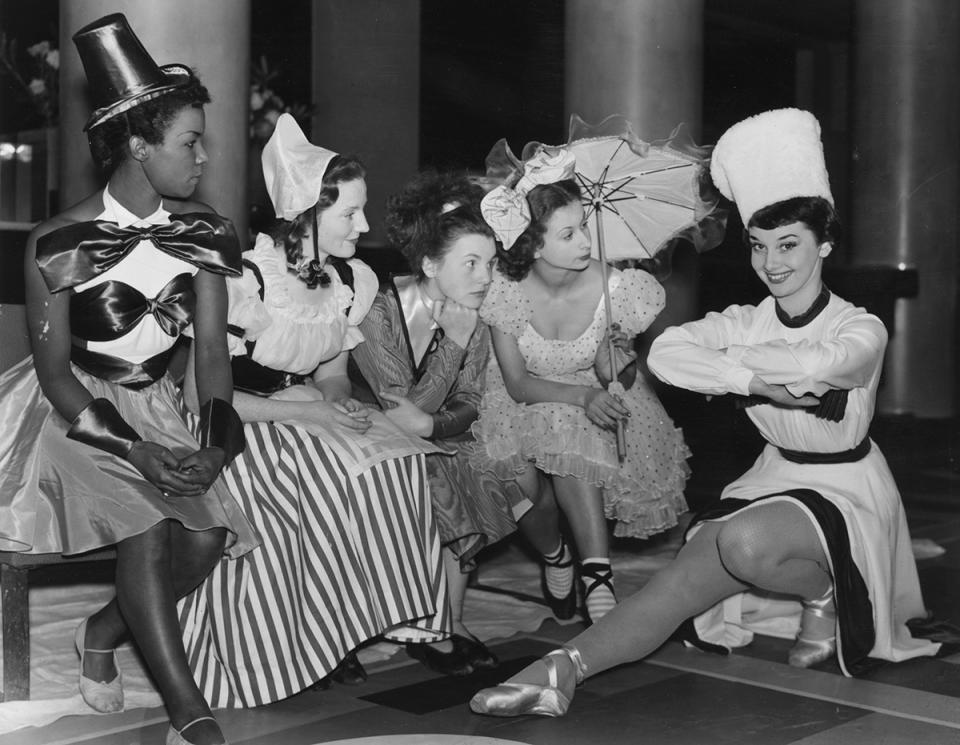 December 1949: Audrey Hepburn with the cast of a Christmas Party revue at the Cambridge Theatre 