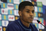 England's Marcus Rashford speaks to the media during a press conference at Al Wakrah Sports Complex, in Al Wakrah, Qatar, Sunday, Nov. 27, 2022. (AP Photo/Abbie Parr)