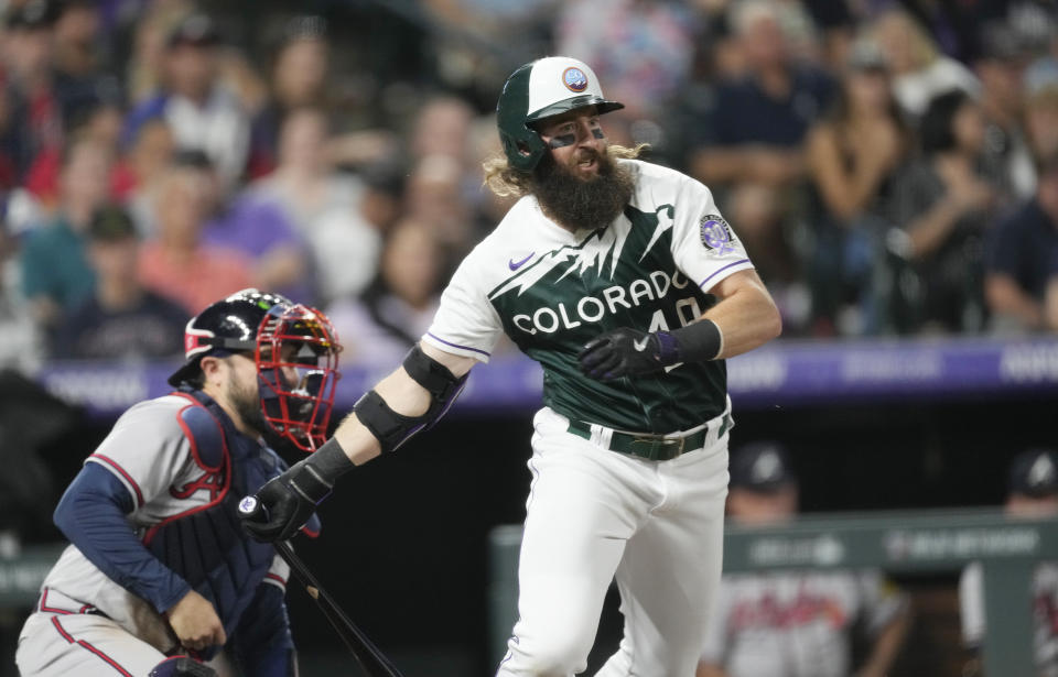 Colorado Rockies' Charlie Blackmon grounds out against Atlanta Braves starting pitcher Darius Vines during the fifth inning of a baseball game Wednesday, Aug. 30, 2023, in Denver. (AP Photo/David Zalubowski)