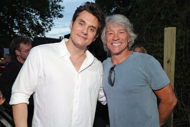 <p>Kevin Mazur/Getty</p> John Mayer and Jon Bon Jovi on Aug. 14, 2023 in the Hamptons