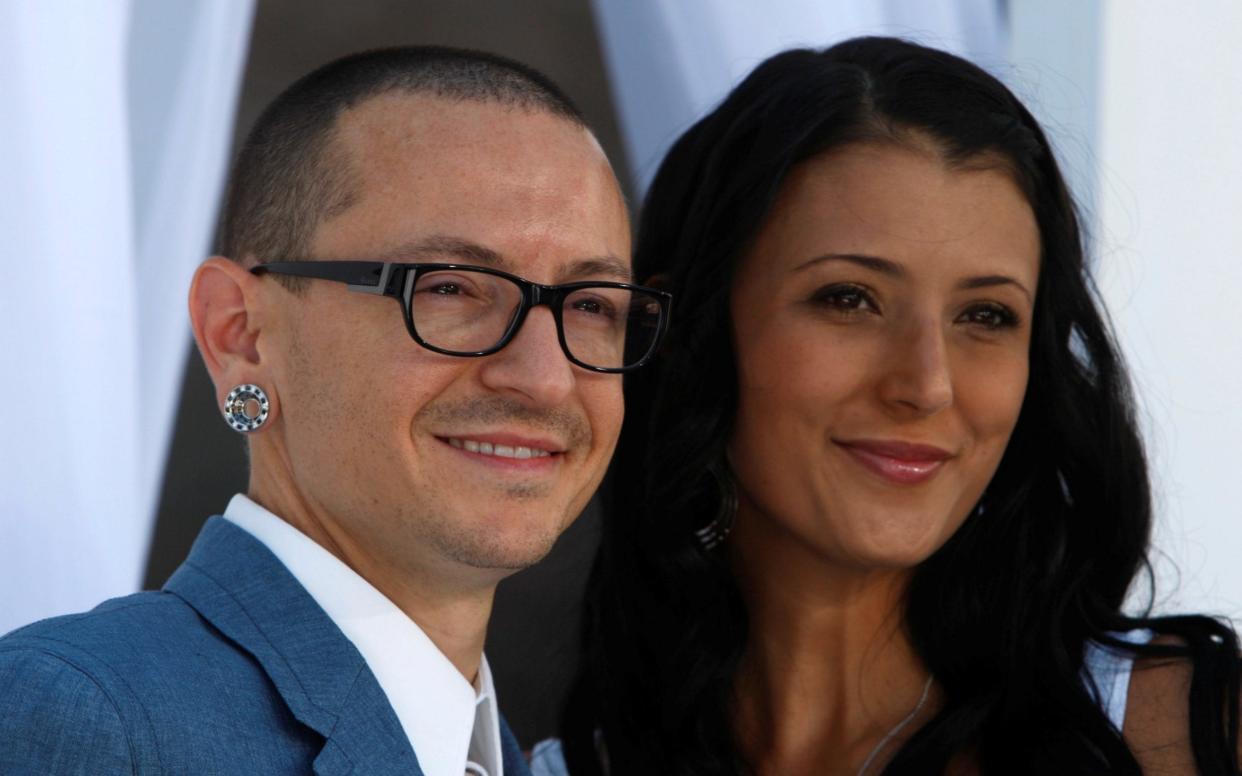 The late Chester Bennington and his wife Talinda, who was targeted by hackers within hours of his death - REUTERS