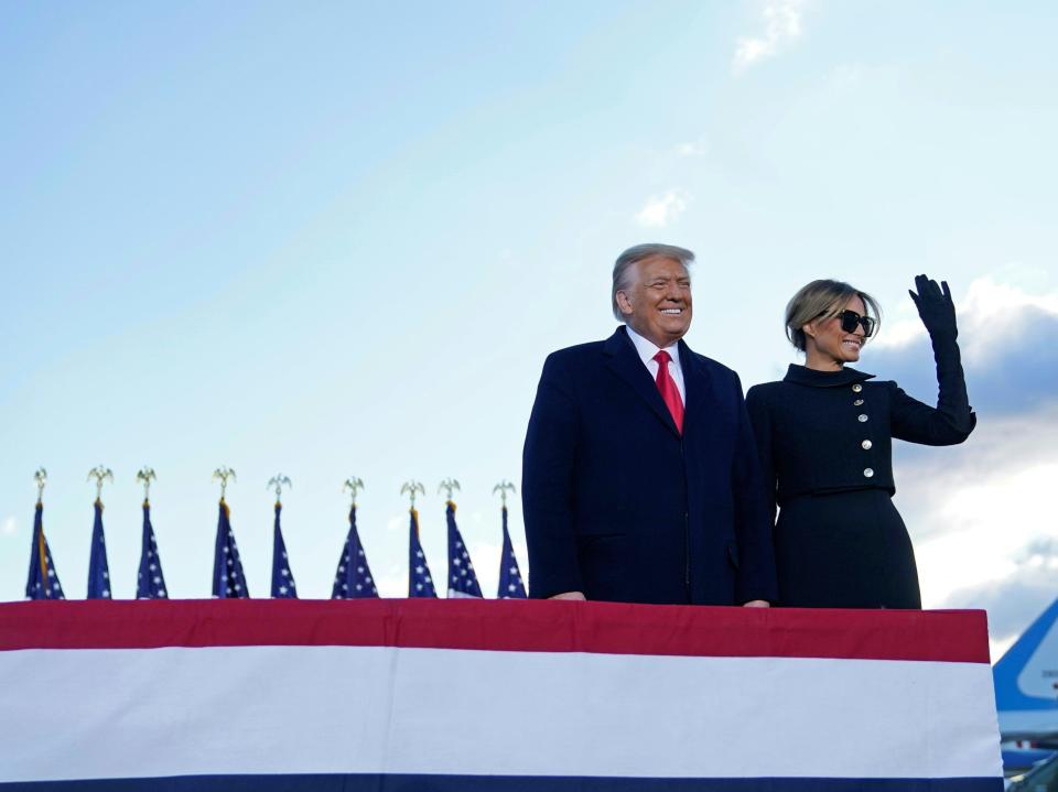 Donald Trump and Melania Trump at Joint Base Andrews in Maryland before heading to their Mar-a-Lago club in Palm Beach, Florida. Mr Trump is the first president in 152 years to refuse to attend the inauguration of their successorAFP via Getty Images