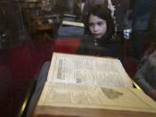 A visitors looks at a Shakespeare First Folio discovered nearly 400 years after his death as it is displayed at Mount Stuart, Isle of Bute, Scotland, Britain April 7, 2016. REUTERS/Russell Cheyne