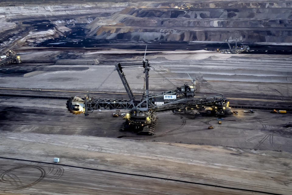 A bucket wheel excavator is mining coal at the Garzweiler open-cast coal mine in Luetzerath, Germany, Wednesday, Nov. 2, 2022. Once the world had hope that when nations got together they could stop climate change. Thirty years after leaders around the globe first got together to try, that hope has melted. (AP Photo/Michael Probst)