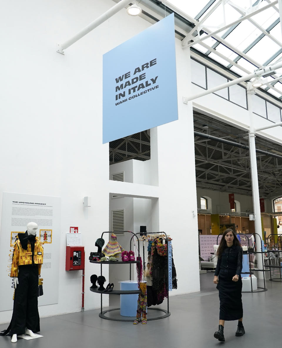 Creations, part of the 'We Are Made in Italy' collecting fashion event are shown during the women's Spring Summer 2023 fashion week, in Milan, Italy, Wednesday, Sept. 21, 2022. Milan Fashion Week opening Wednesday celebrates perhaps its most diverse season ever, abuzz with new creative directors of color at such storied houses as Salvatore Ferragamo and Bally and marking the return of Haitian-Italian designer Stella Jean after a two-year haitus. But Jean and other industry insiders behind a two-year campaign to open the Italian fashion world to talent from minority backgrounds say true inclusivity remains elusive. (AP Photo/Alberto Pezzali)