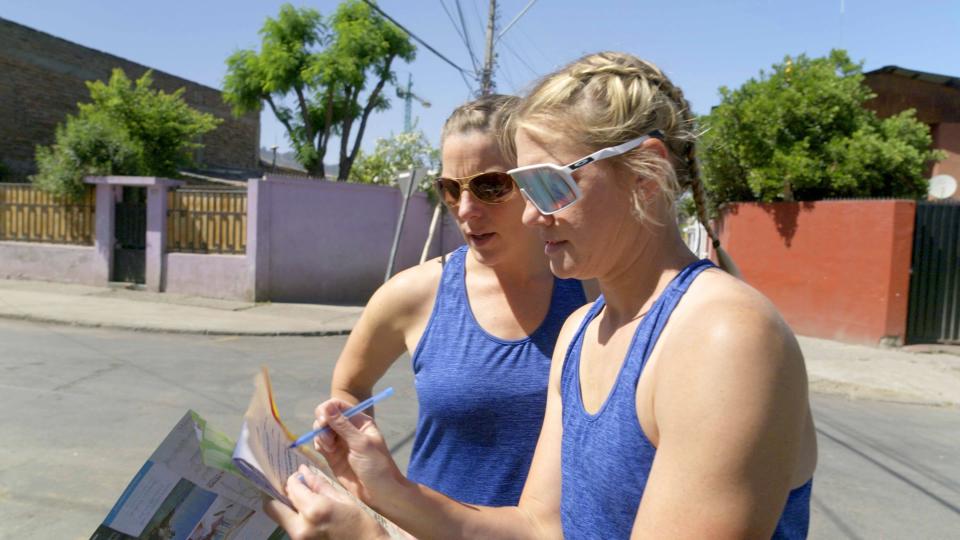 Wisconsin firefighters Sunny Pulver and Bizzy Smith look at directions while attempting to navigate around Santiago, Chile, and find their next clue at the beginning of the fifth episode on "The Amazing Race." Pulver and Smith fell quickly into last place but clawed their way back again to finish in seventh of nine teams to survive another leg.