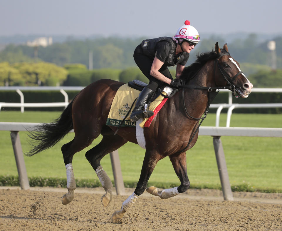 Exercise rider Kim Carroll rides War of Will during a workout at Belmont Park in Elmont, N.Y., Thursday, June 6, 2019. The 151st Belmont Stakes horse race will be run on Saturday, June 8, 2019. (AP Photo/Seth Wenig)