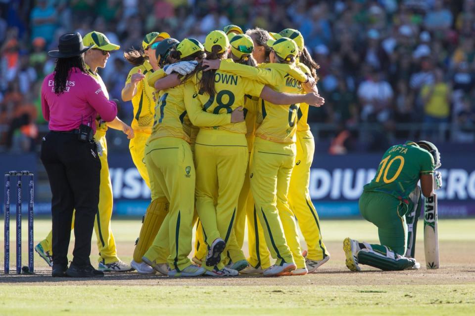 Australia players celebrate beating South Africa (Halden Krog/AP) (AP)