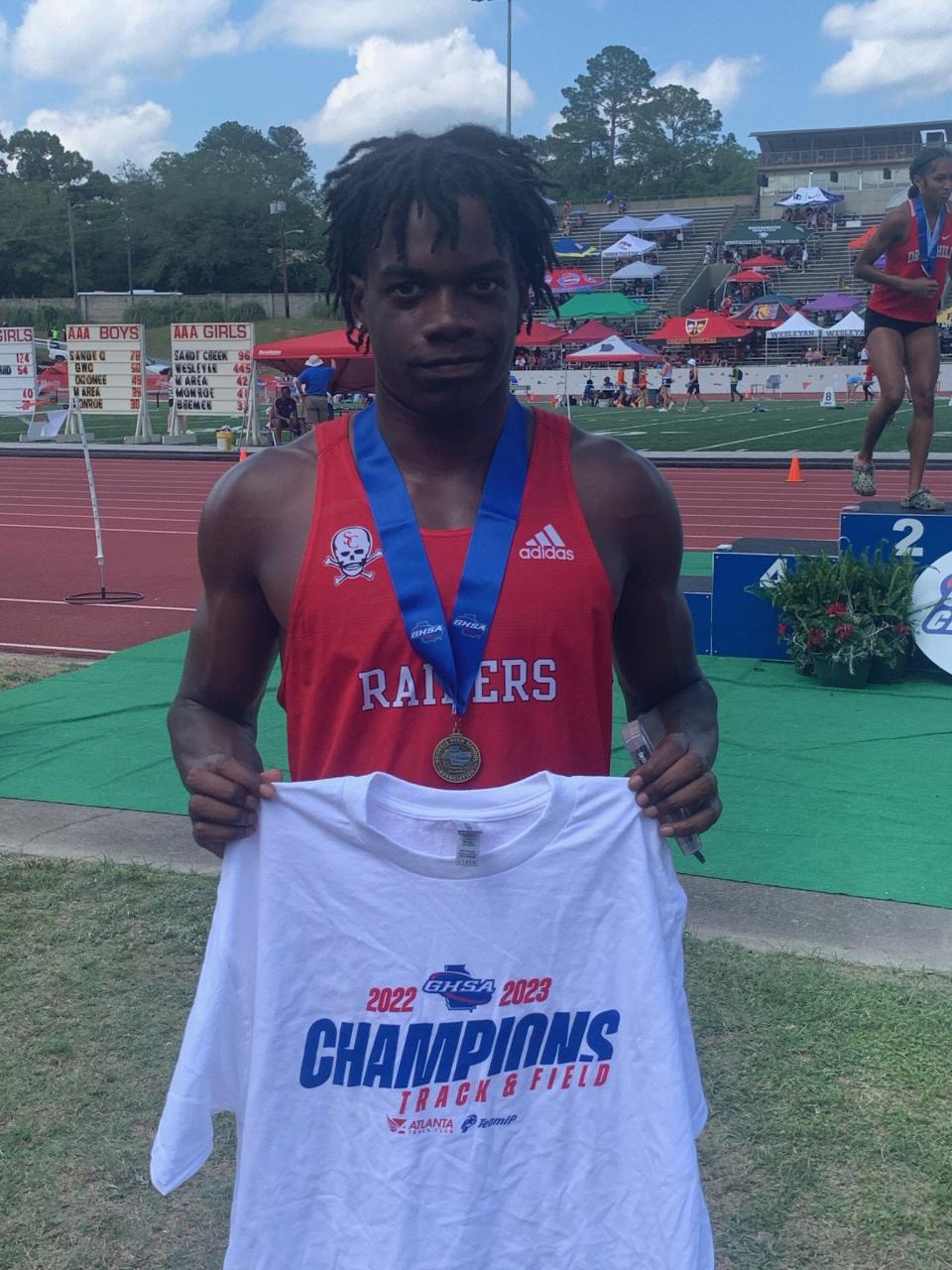 Jamari McIvory of Savannah Christian after winning the Class 3A State 200 meter title.