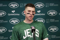 New York Jets quarterback Mike White speaks during a news conference after an NFL football game against the Minnesota Vikings, Sunday, Dec. 4, 2022, in Minneapolis. The Vikings won 27-22. (AP Photo/Bruce Kluckhohn)