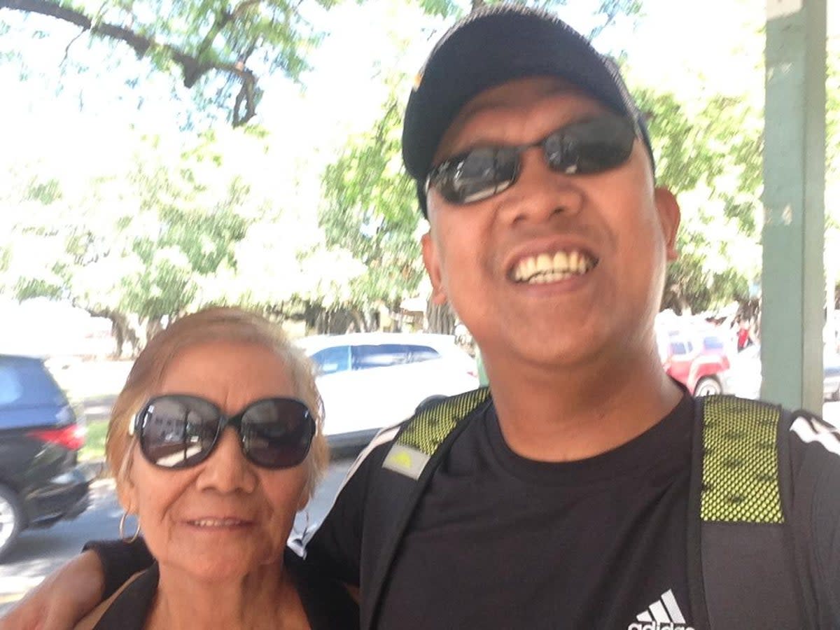 Mr Navarro is pictured here with his mother, who he last saw eight years ago (Supplied)
