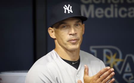 Apr 2, 2017; St. Petersburg, FL, USA; New York Yankees manager Joe Girardi (28) looks on prior to the game against the Tampa Bay Rays at Tropicana Field. Mandatory Credit: Kim Klement-USA TODAY Sports