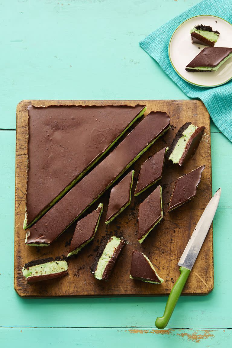 <p>You didn't think we forgot about dessert, did you? This sweet treat may not look green at first, but after you cut into this cake, you'll find the creamy, minty filling that gives this dish it's name. </p><p><em><a href="https://www.womansday.com/food-recipes/food-drinks/a16810585/grasshopper-bars-recipe/" rel="nofollow noopener" target="_blank" data-ylk="slk:Get the recipe from Woman's Day »;elm:context_link;itc:0;sec:content-canvas" class="link ">Get the recipe from Woman's Day »</a></em></p>