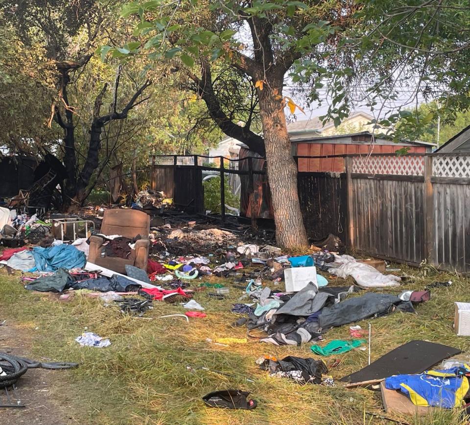 Aftermath of the encampment fire at the 900 block of Angus Street early morning on Monday. 