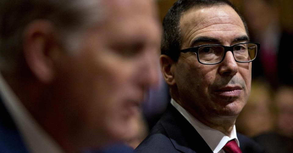 Steven Mnuchin, right, during his Senate hearing. Andrew Harrer | Bloomberg | Getty Images