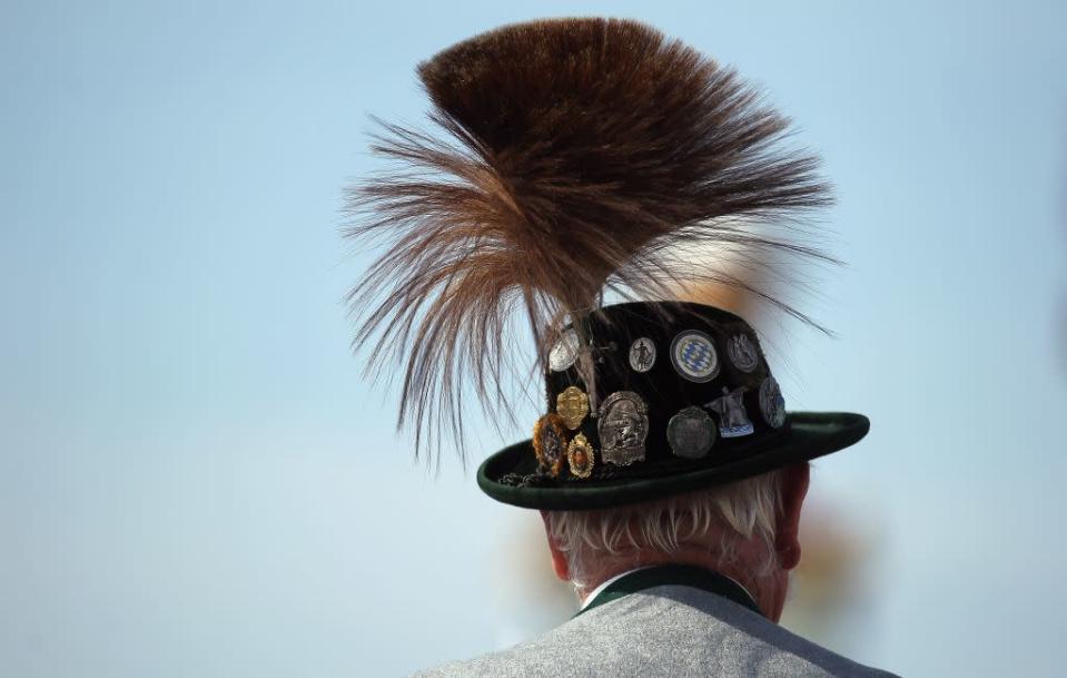 A member of a riflemen's association wears a traditional Bavarian Gamsbart hat.