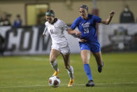 Florida State's Kirsten Pavlisko (11) goes after the ball against BYU's Cameron Tucker (20) during the first half in the NCAA College Cup women's soccer final Monday, Dec. 6, 2021, in Santa Clara, Calif. (AP Photo/Tony Avelar)