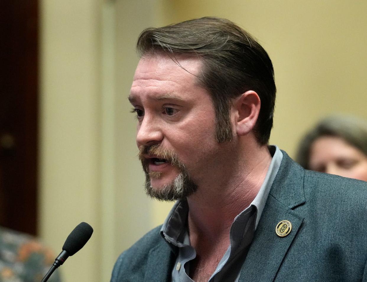 Justin Kelley of the International Union of Painters and Allied Trades speaks during the Reclaim Rhode Island "housing justice" press conference at the RI State House on March 26, 2024.