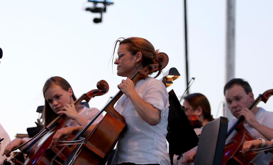 The Oklahoma City Philharmonic plays during its Red, White and Boom! concert at the State Fair Park in Oklahoma City,  Tuesday, July 3, 2018.