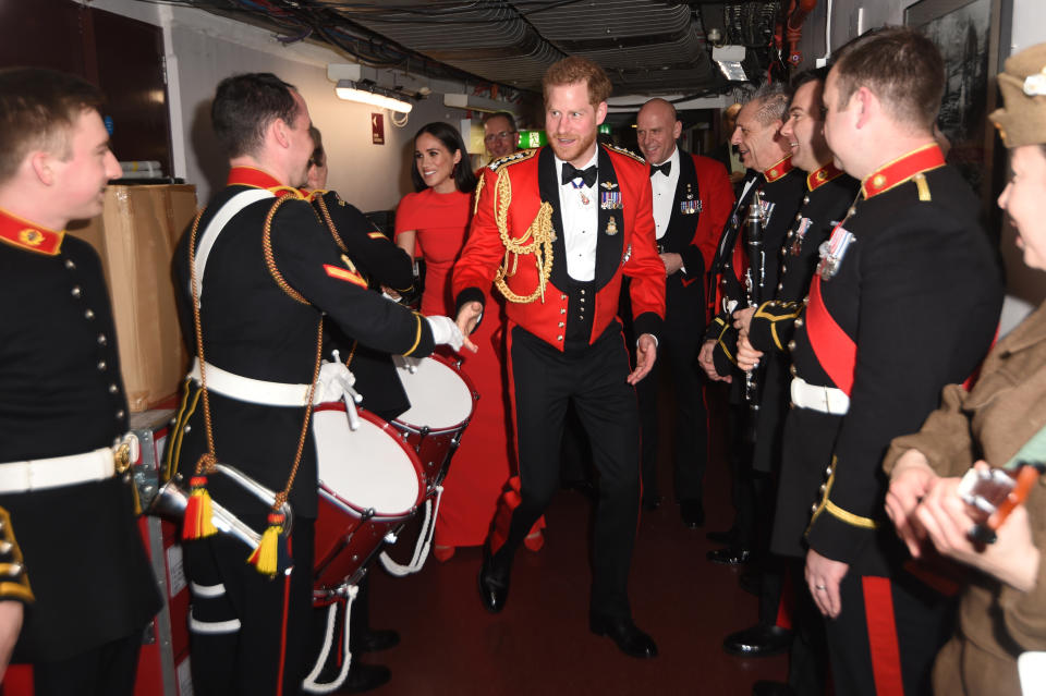 LONDON, ENGLAND - MARCH 07: Prince Harry, Duke of Sussex and Meghan, Duchess of Sussex meet band members as they attend the Mountbatten Music Festival at the Royal Albert Hall on March 7, 2020 in London, England. (Photo by Eddie Mulholland-WPA Pool/Getty Images)