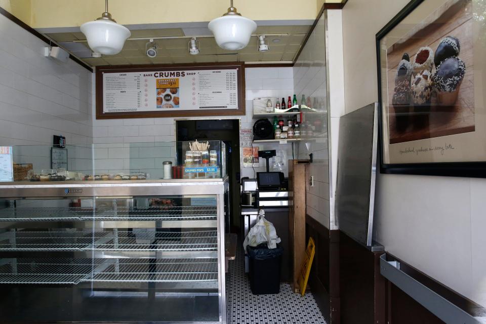 A Crumbs Bake Shop location sits closed and empty in New York City in 2014, the year that Crumbs had to shutter its stores temporarily to figure out how to stay in business.