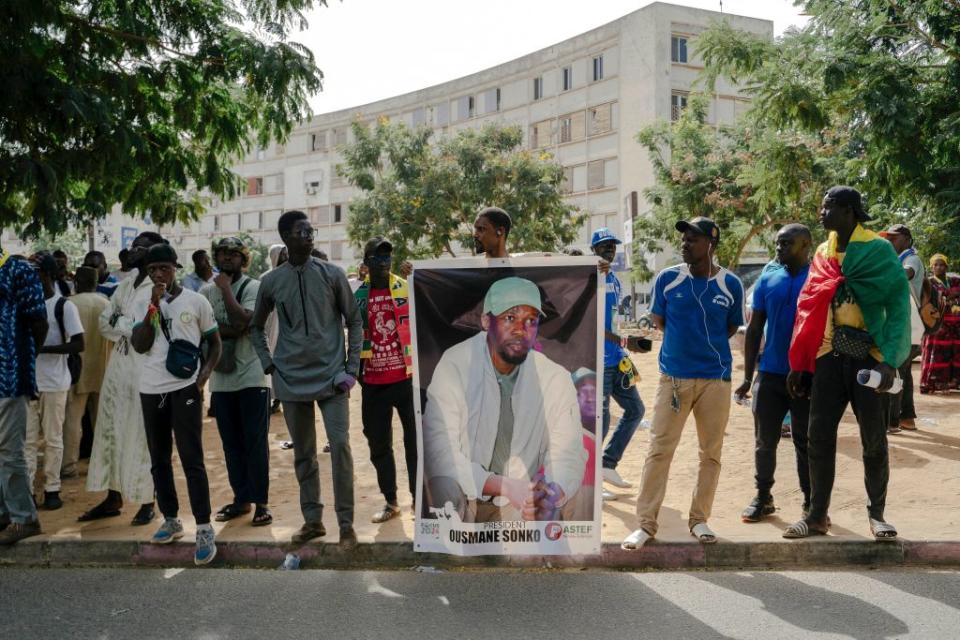 Demonstrators hold a banner depicting detained Senegalese opposition leader Ousmane Sonko during a rally to demand the release of all political prisoners, in Dakar on Oct. 27, 2023.<span class="copyright">Carmen Abd Ali—AFP/Getty Images</span>
