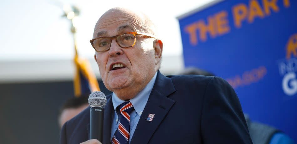 Former New York City Mayor Rudy Giuliani arrives to campaign for Republican Senate hopeful Mike Braun on November 3, 2018 in Franklin Township, Indiana.