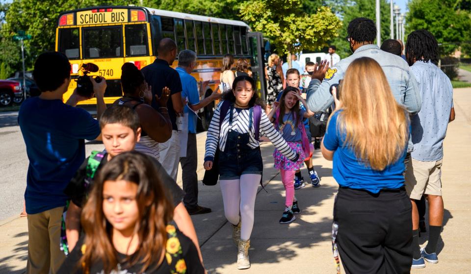 Community leaders welcome students on the first day of school at Fairview Elementary on Wednesday, Aug. 3, 2022. The annual event is put on by Commission on the Status of Black Males.