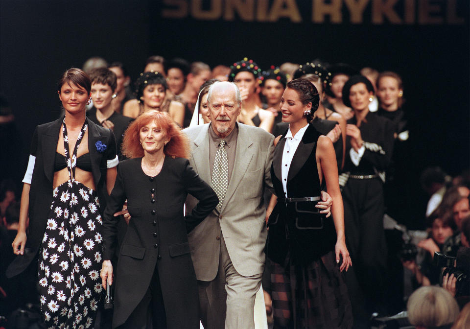 French designer Sonia Rykiel flanked by