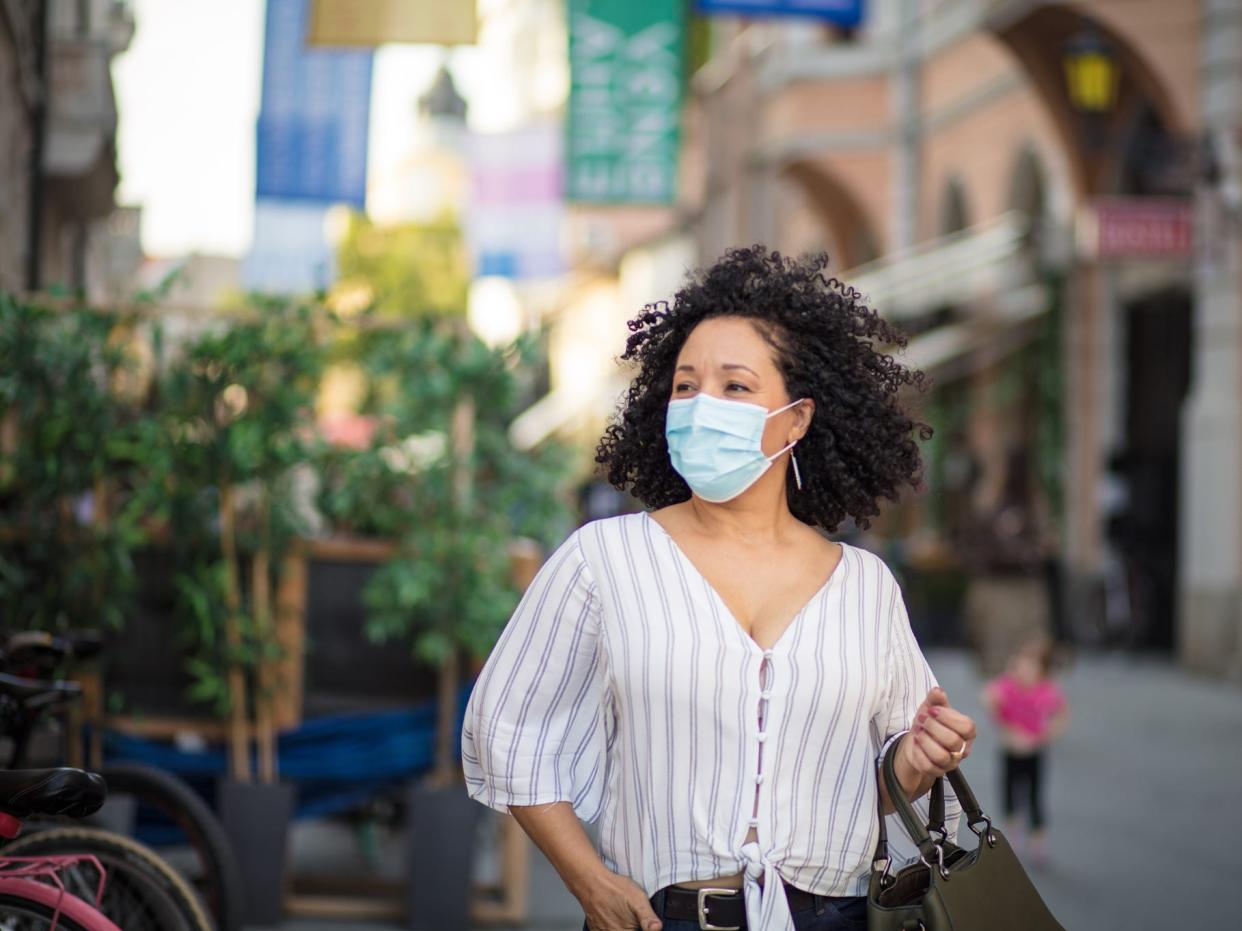 Female traveler Europe face mask