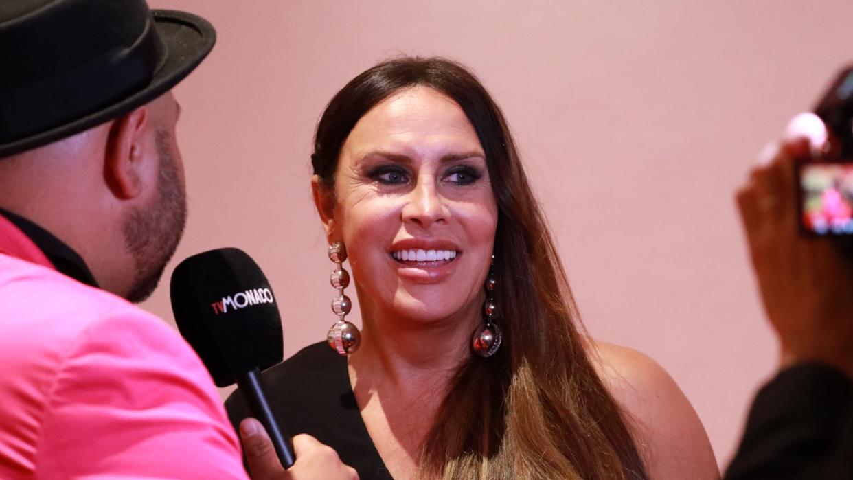 Karla Sofía Gascón being interviewed at Cannes