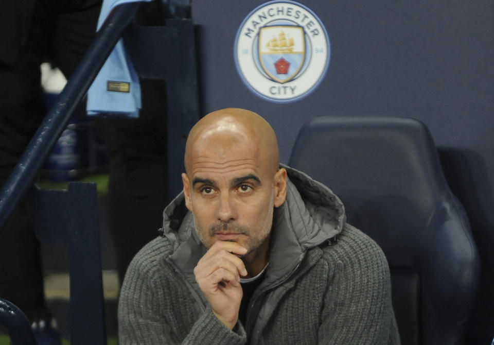 Manchester City coach Pep Guardiola looks on before the Champions League Group F soccer match between Manchester City and Shakhtar Donetsk at Etihad stadium in Manchester, England, Wednesday, Nov. 7, 2018. (AP Photo/Rui Vieira)