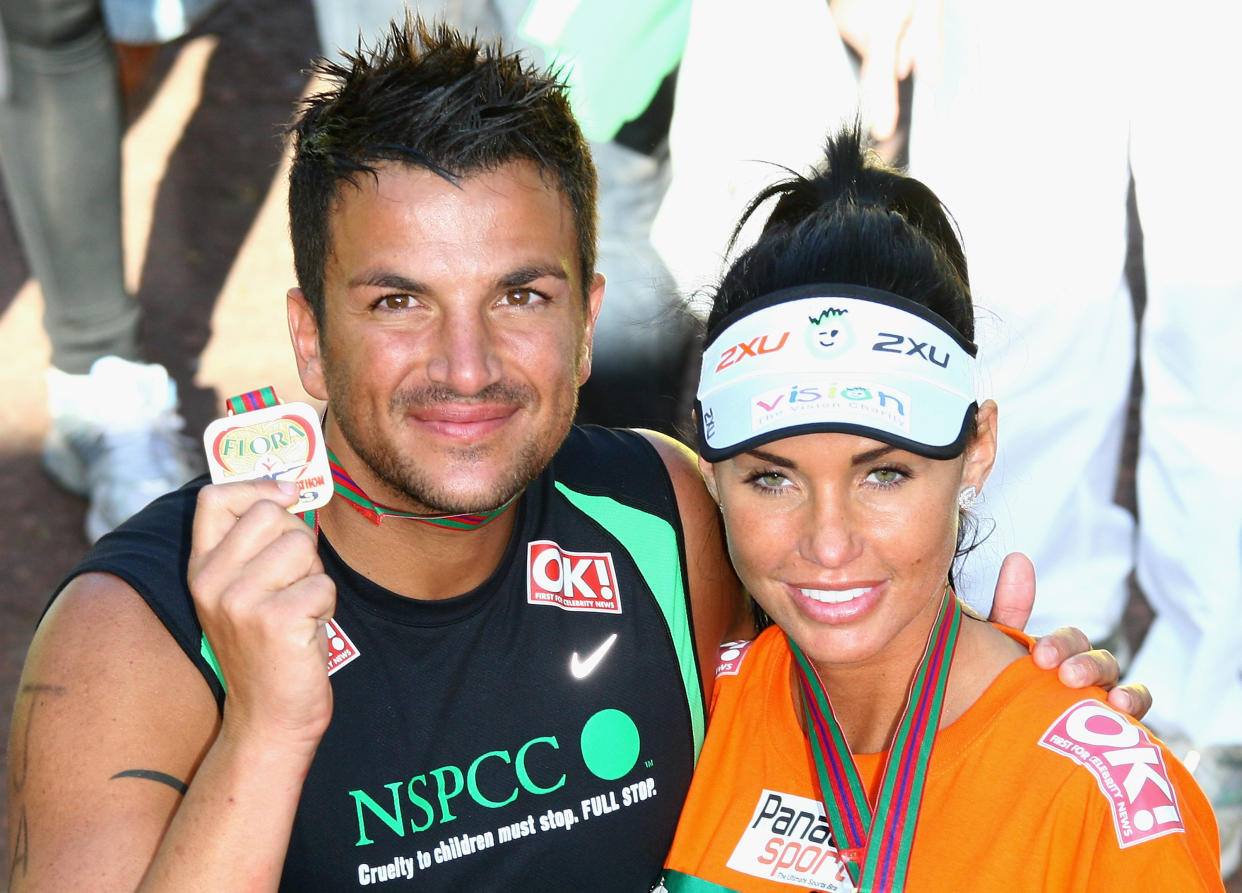 LONDON - APRIL 26:  Katie Price and Peter Andre pose after they completed the 2009 Flora London Marathon on April 26, 2009 in London, England.  (Photo by Gareth Cattermole/Getty Images)