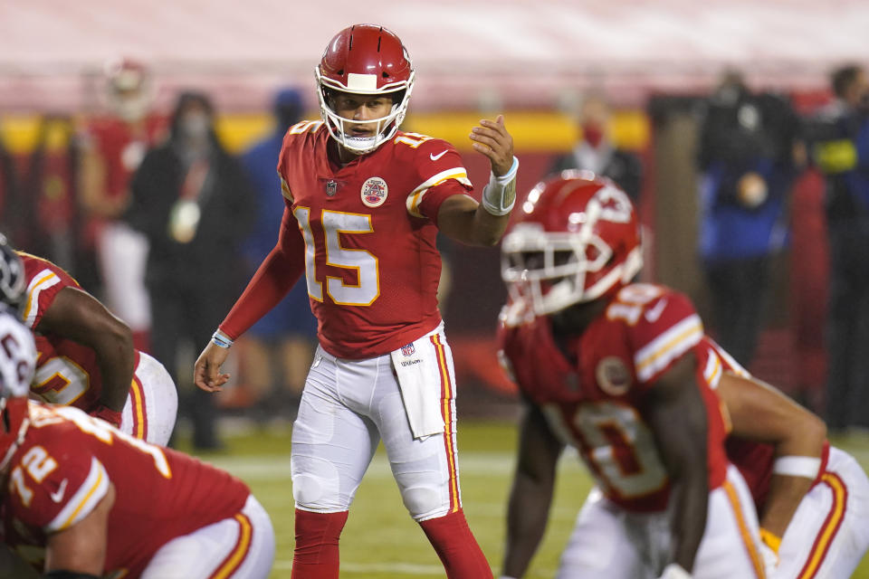 Kansas City Chiefs quarterback Patrick Mahomes (15) directs a teammate in the second half of an NFL football game against the Houston Texans Thursday, Sept. 10, 2020, in Kansas City, Mo. (AP Photo/Jeff Roberson)