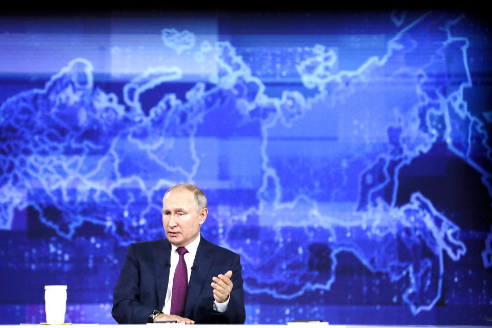 Russian President Vladimir Putin gestures during his annual live call-in show in Moscow, Russia, Wednesday, June 30, 2021. Speaking in a live call-in program Wednesday, Vladimir Putin has voiced hope that the country could avoid a nationwide lockdown amid a surge of new infections. (Sergei Savostyanov, Sputnik, Kremlin Pool Photo via AP)