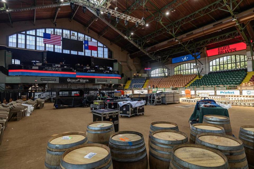 Workers begin to work on transforming the inside of the Cowtown Coliseum for the 2024 MLB Draft in the Fort Worth Stockyards on Thursday.