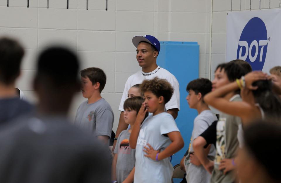 Desmond Bane stands with young campers at his basketball camp July 20, 2022.