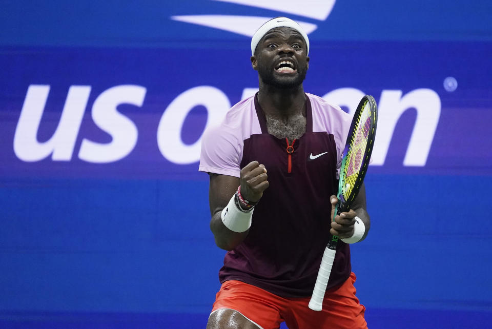 Frances Tiafoe, of the United States, reacts after winning the fourth set against Carlos Alcaraz, of Spain, during the semifinals of the U.S. Open tennis championships, Friday, Sept. 9, 2022, in New York. (AP Photo/John Minchillo)