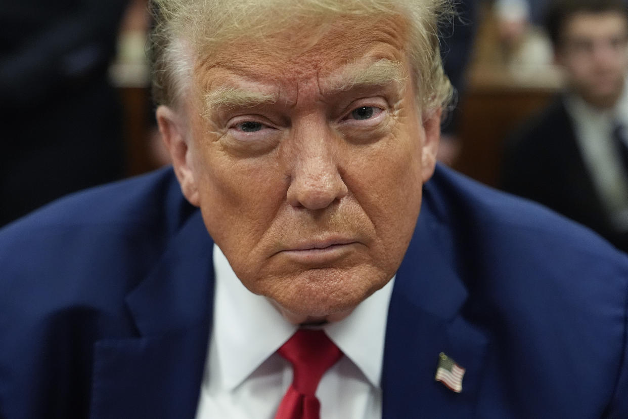 Former President Donald Trump sits at the defense table inside Manhattan Criminal Court before court proceedings begin at his hush money trial on Monday. (Julia Nikhinson/Pool via Getty Images)