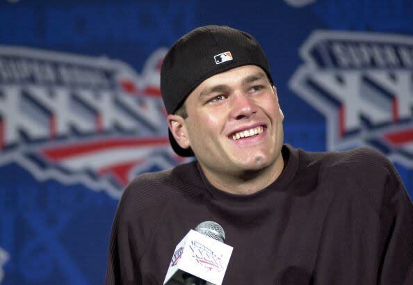 2001: Thursday, January 31, 2001 -- Tom Brady was all smiles at a press conference on Thursday after being named starting quarterback for the Patriots on Sunday.  (Photo by Gregory Rec/Portland Press Herald via Getty Images)
