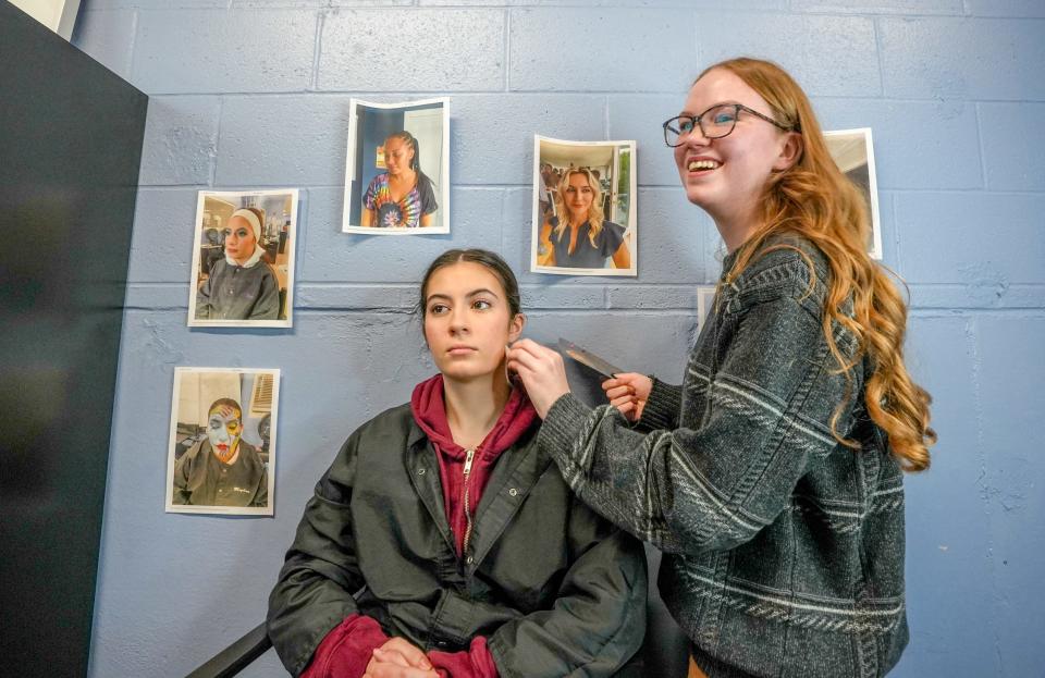 Emmalee Bettez does makeup on classmate Eliza Gencarella. It was only last school year that Bettez started doing makeup as part of her cosmetology class at Westerly High School, but the now-17-year-old senior was hooked almost immediately.