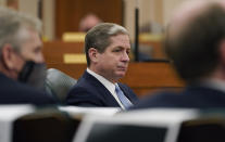 Kirk Morgan, Vistra chief executive officer, answers questions for the Committees on State Affairs and Energy Resources as they hold a joint public hearing to consider the factors that led to statewide electrical blackouts, Thursday, Feb. 25, 2021, in Austin, Texas. The hearings were the first in Texas since a blackout that was one of the worst in U.S. history, leaving more than 4 million customers without power and heat in subfreezing temperatures. (AP Photo/Eric Gay)