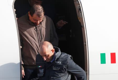 Former Italian leftist guerrilla Cesare Battisti arrives at Ciampino airport in Rome, Italy, January 14, 2019. REUTERS/Max Rossi