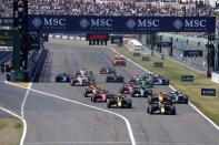 Red Bull driver Max Verstappen, center right, of the Netherlands leads the field shortly after the start of the Japanese Formula One Grand Prix at the Suzuka Circuit in Suzuka, central Japan, Sunday, April 7, 2024. (AP Photo/Hiro Komae)