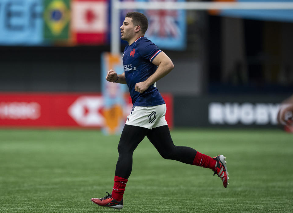 France's Antoine Dupont runs onto the pitch during the team's Vancouver Sevens rugby match against the United States on Friday, Feb. 23, 2024, in Vancouver, British Columbia. (Ethan Cairns/The Canadian Press via AP)