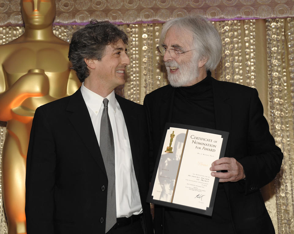 Director Alexander Payne, left, and director Michael Haneke pose together during the The Oscars Foreign Language Film Award Directors Reception at The Academy of Motion Picture Arts and Sciences in Beverly Hills, Calif. on Friday, Feb. 22, 2013. Haneke's feature film "Amour" is nominated for Best Foreign Language Film. (Photo by Dan Steinberg/Invision/AP)