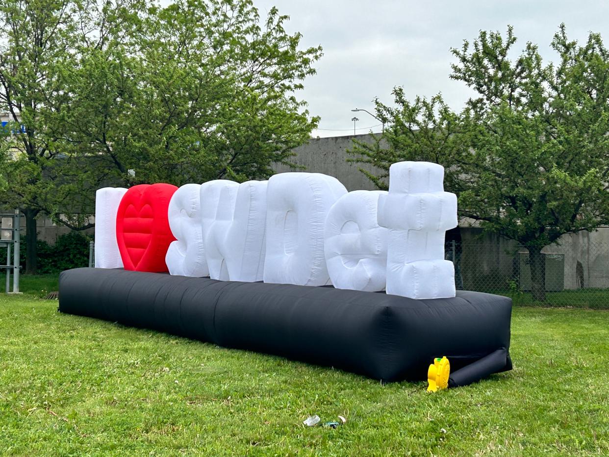 An inflatible "I 'heart' swdet" sign stands as a photo backdrop for those attending the 59th annual Cinco de Mayo festival at Bagely and 21st Street.