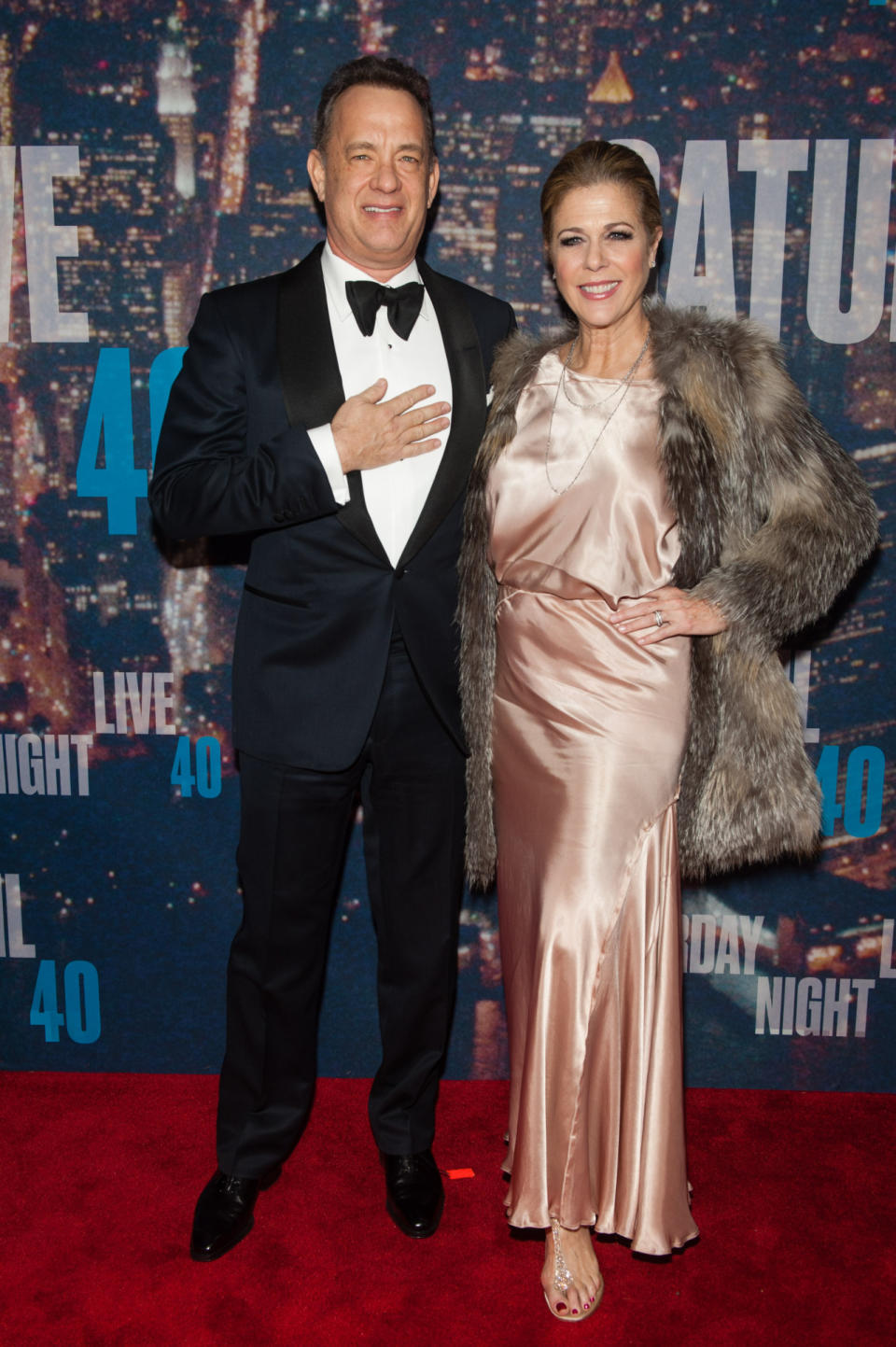 Rita Wilson was maybe the only woman to wear a Spring color to a Winter event — and it looked amazing! Her husband looks pretty good too in a tux.