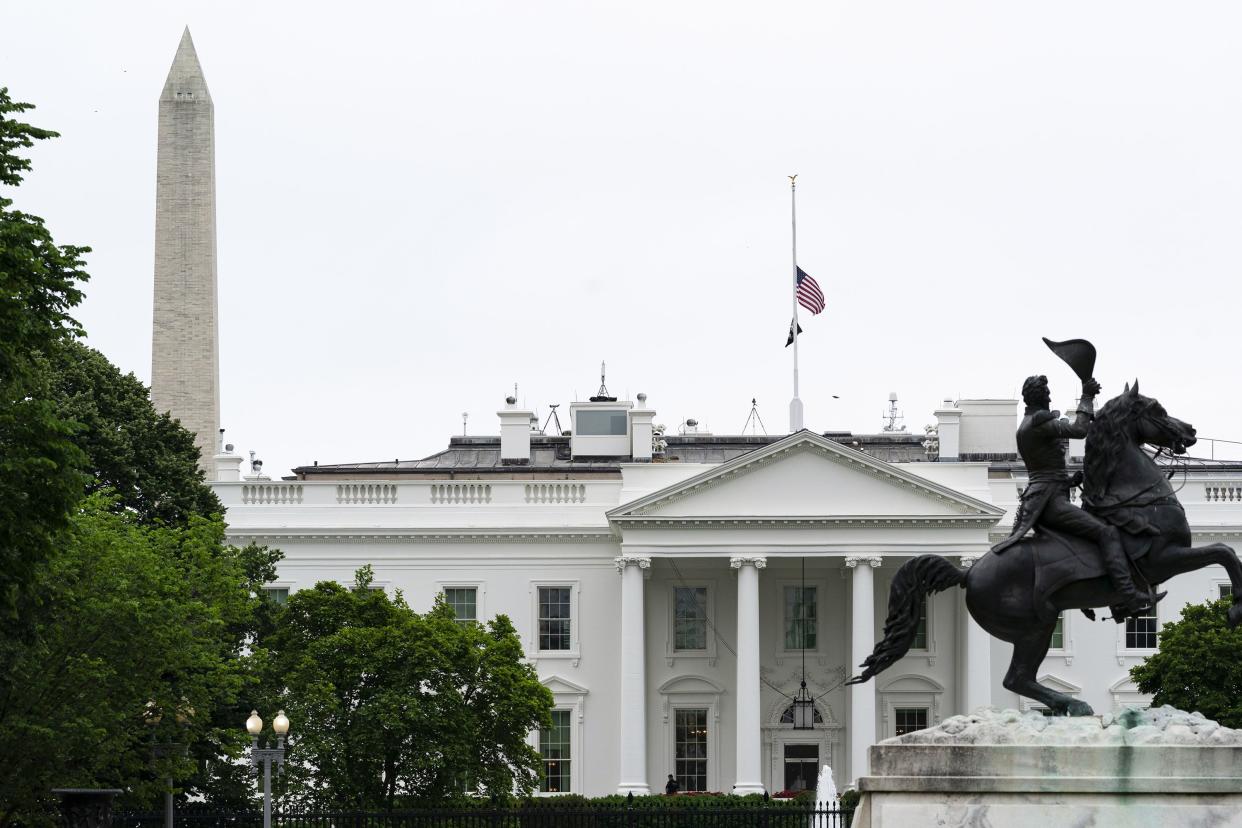 The flags fly at half-staff over the White House by order of President Joe Biden on Wednesday, May 25, 2022, in Washington, DC, following the Texas school shooting that left 19 kids and 2 teachers dead.