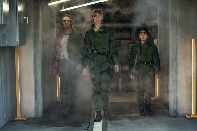 <p>Courtesy of Warner Bros. Pictures</p> (L-r) DAN STEVENS as Trapper, REBECCA HALL as Dr. Ilene Andrews and KAYLEE HOTTLE as Jia in Warner Bros. Pictures and Legendary Pictures’ action adventure “GODZILLA x KONG: THE NEW EMPIRE,” a Warner Bros. Pictures release